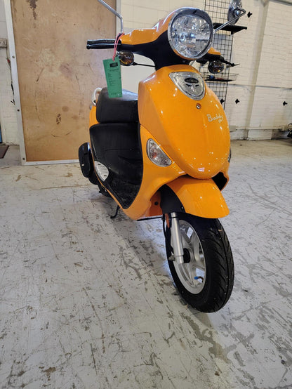Tangerine 2021 Genuine Buddy 50 scooter, front three-quarter view