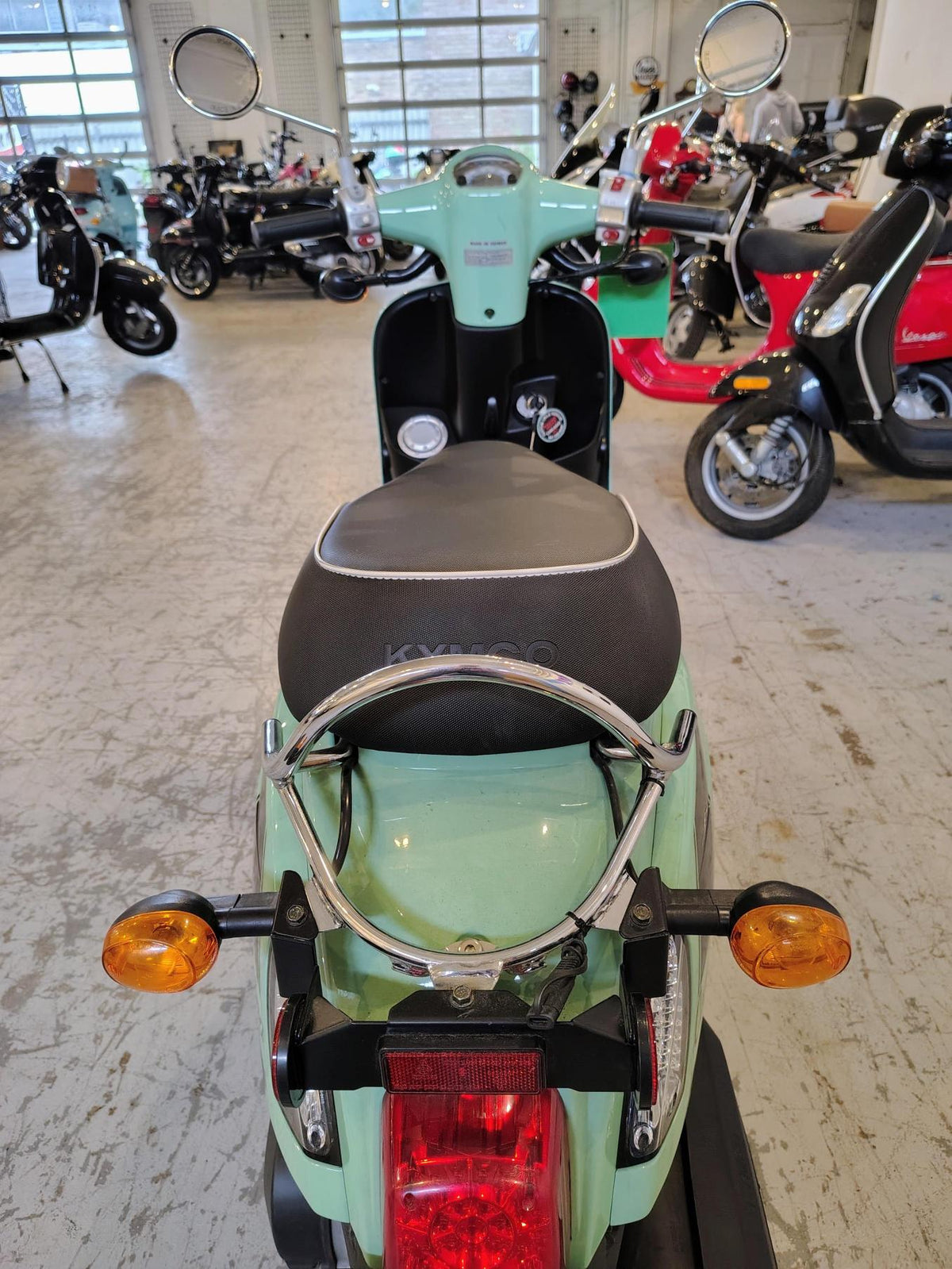 2018 KYMCO Compagno 110i scooter, front three-quarter view