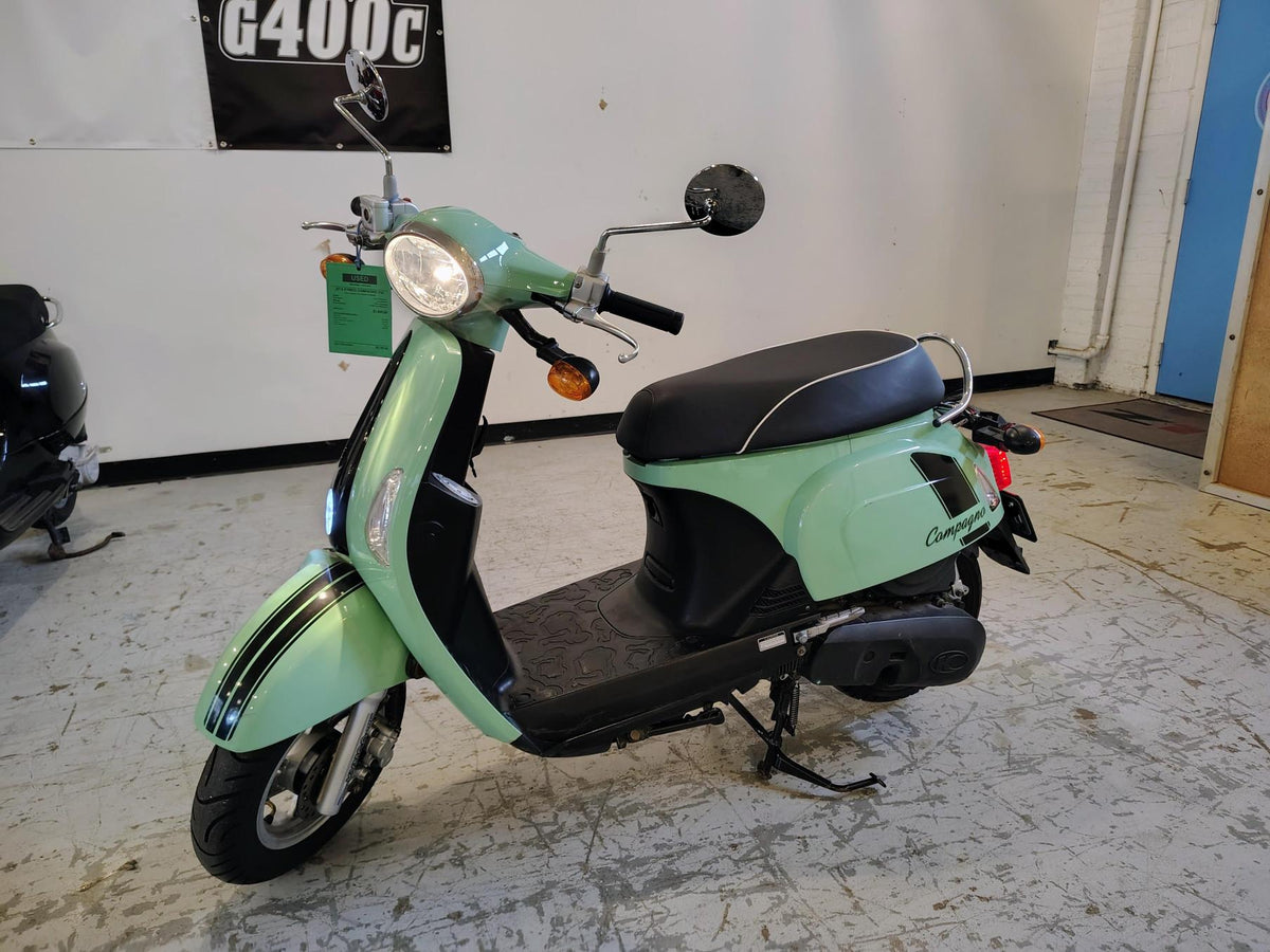 KYMCO Compagno 110i odometer displaying 402 miles