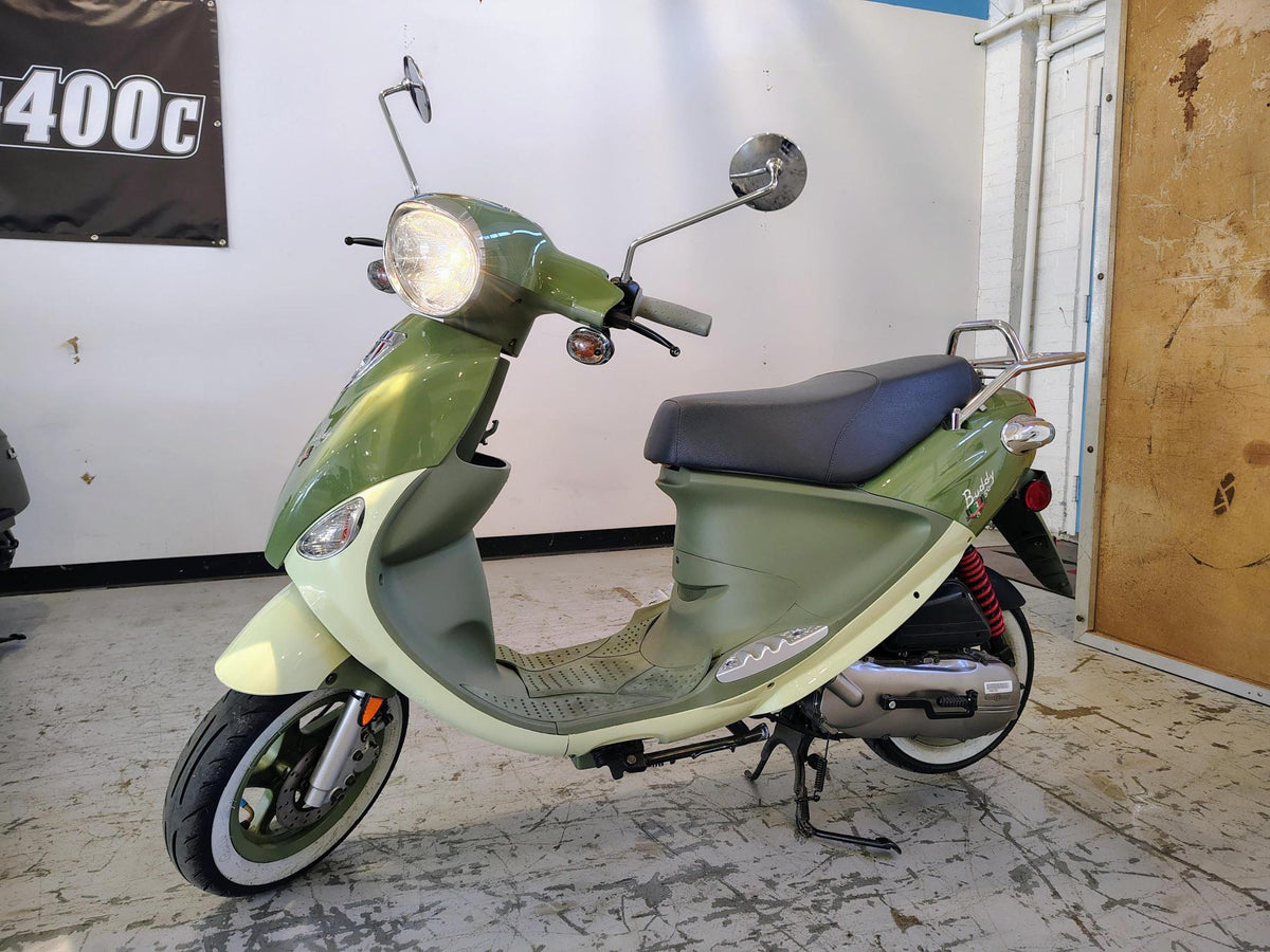 2023 Genuine Buddy 50 Italia scooter with whitewall tires, front three-quarter view