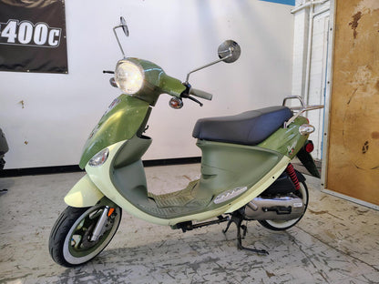 2023 Genuine Buddy 50 Italia scooter with whitewall tires, front three-quarter view
